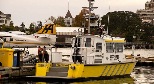 Firefighters dive into water to save man near bridge in Victoria